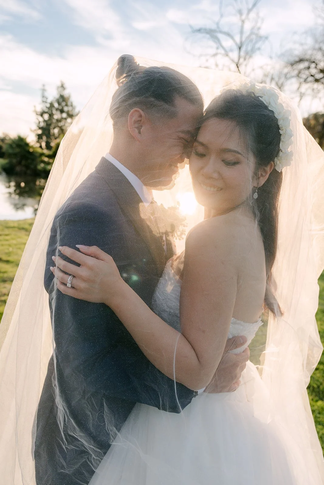 Kate and Michael close together at golden hour.