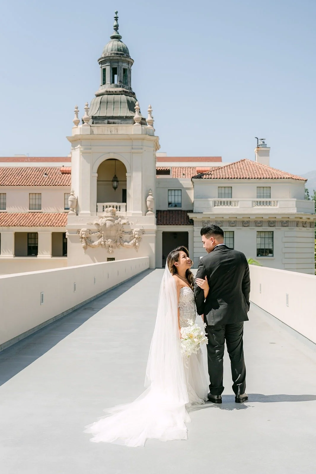 Candice and Vincent with the Pasadena City Hall dome behind them