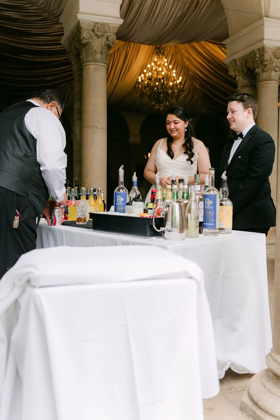 Saira and Matthew getting drinks at the bar