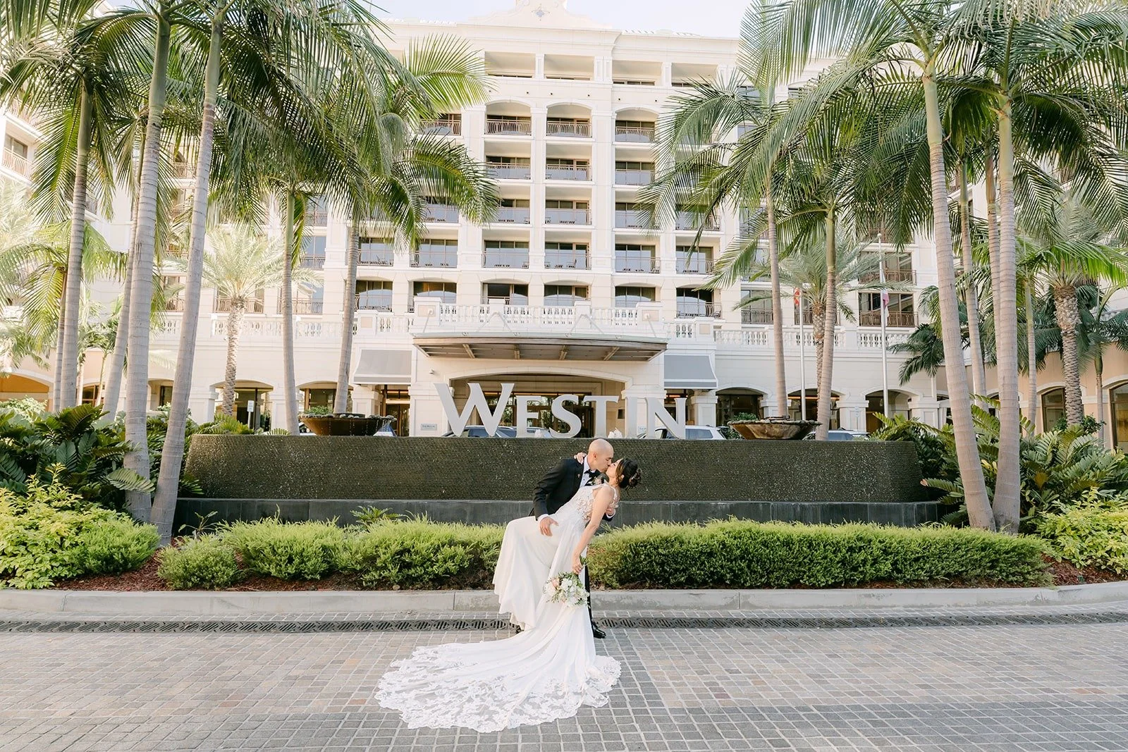 Daniel dips Francesca in front of The Westin Anaheim Resort