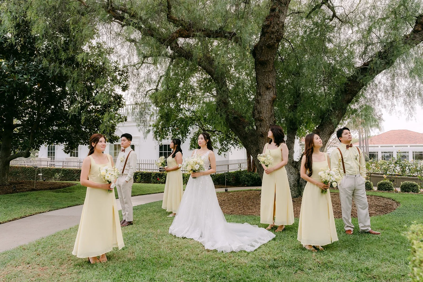 Jenny's bridal party on the lawn at the Nixon Library.