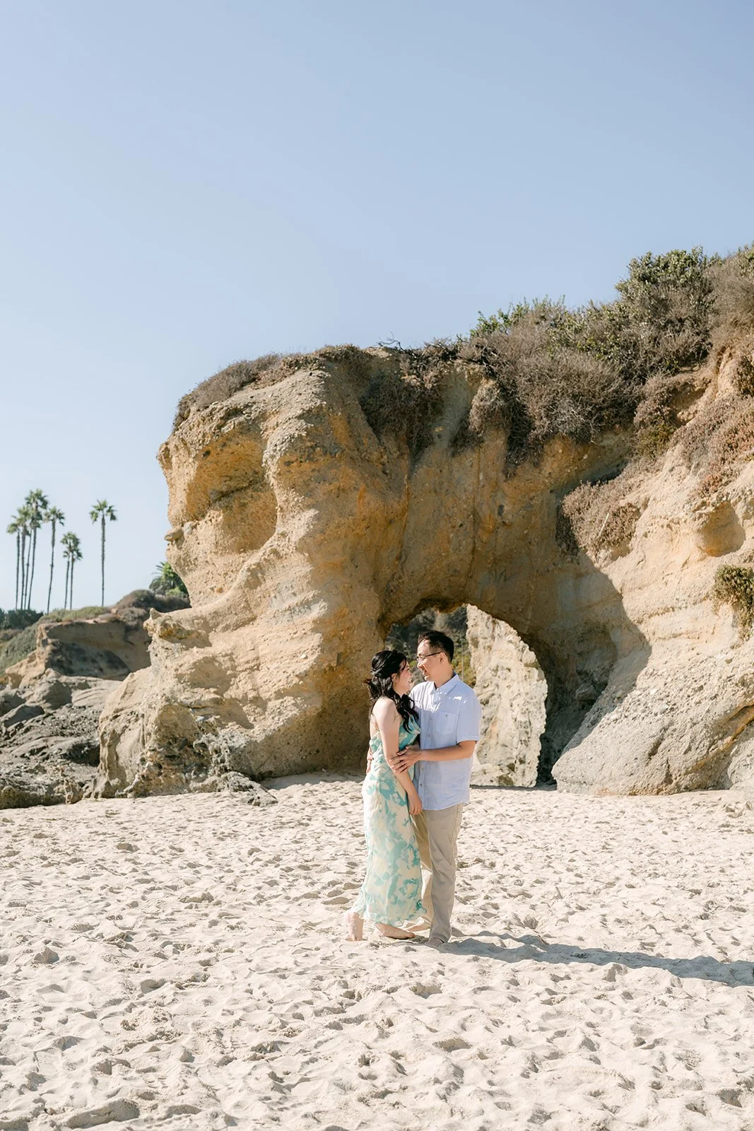 Constance and Lawrence beside the sandstone formation.