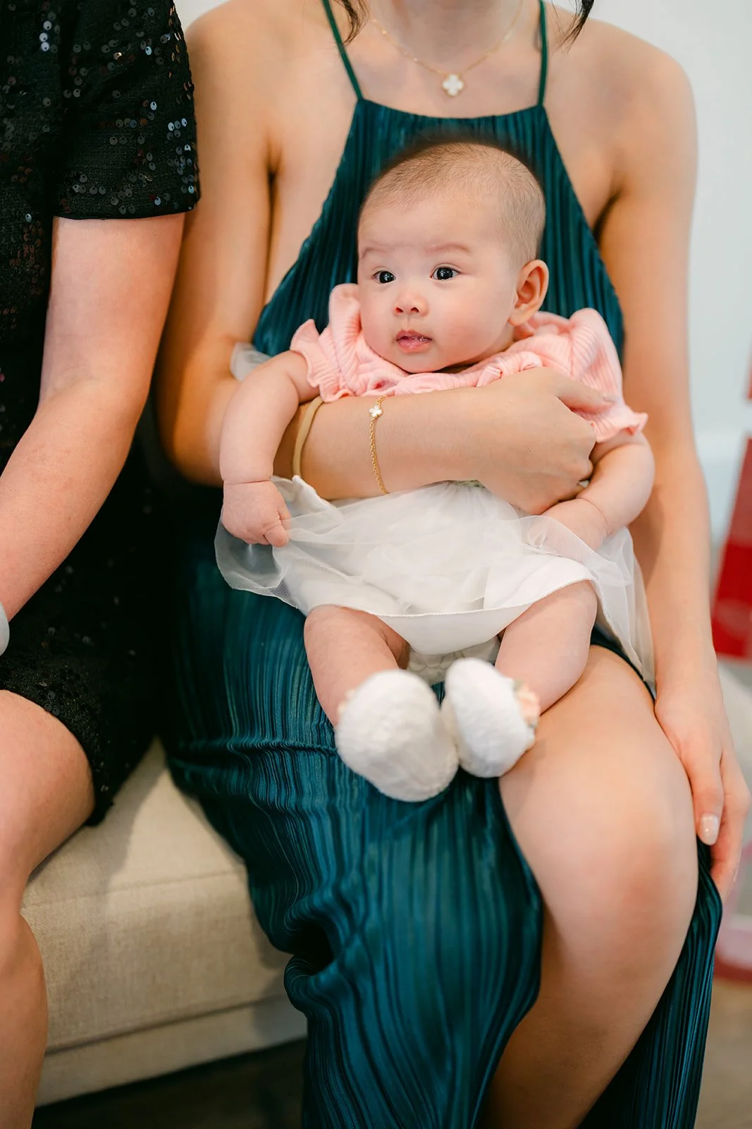 A baby in the family at the tea ceremony.