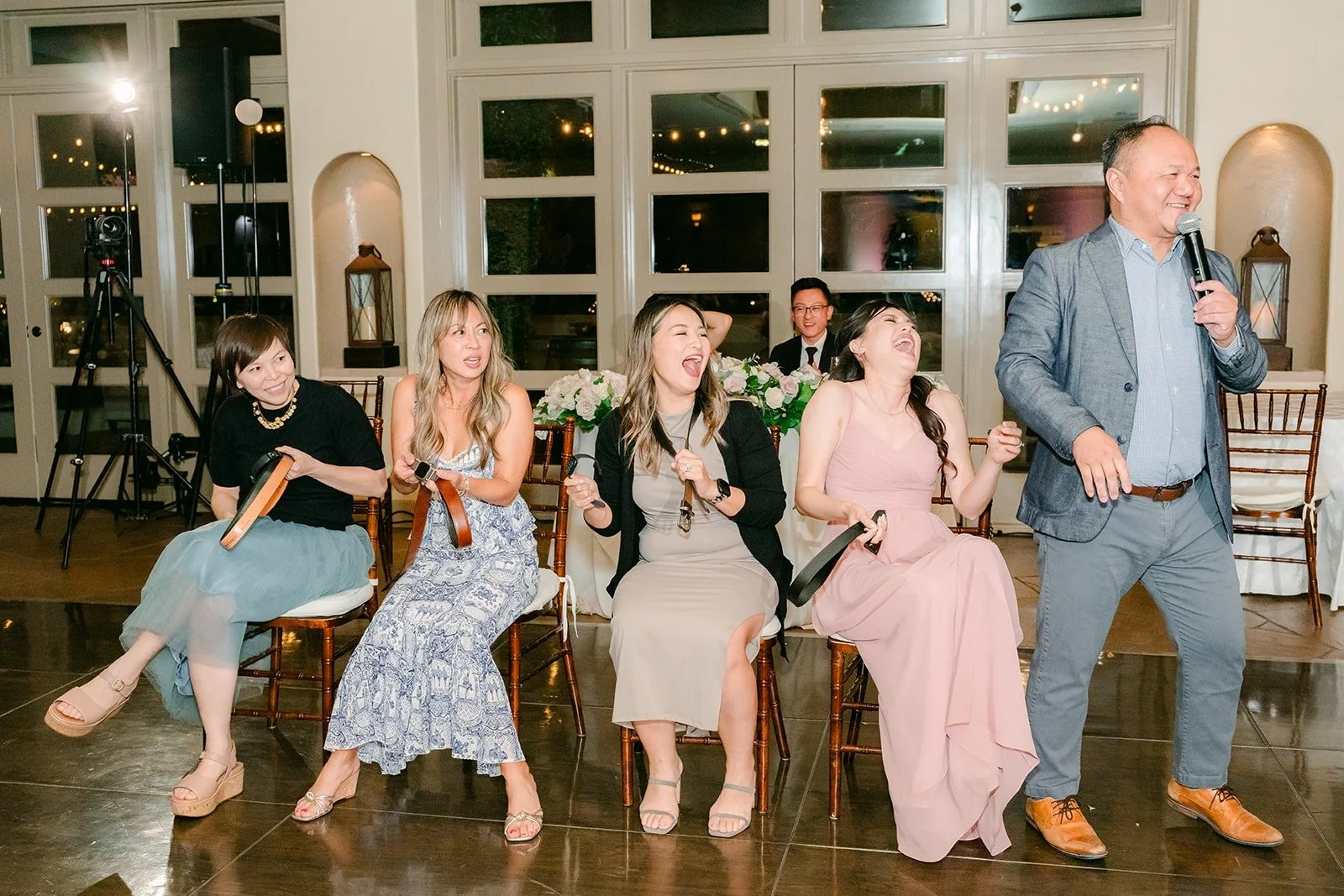 Guests dancing in a circle on the dance floor