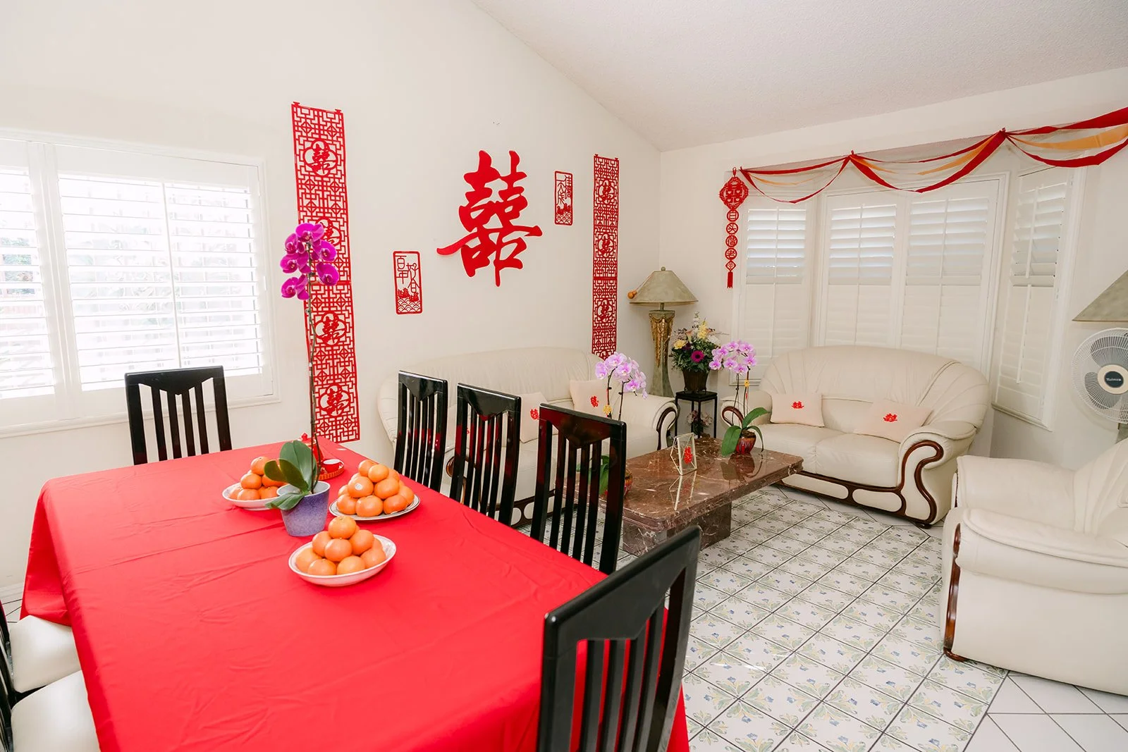 The tea table set with a red cloth and double happiness decor.