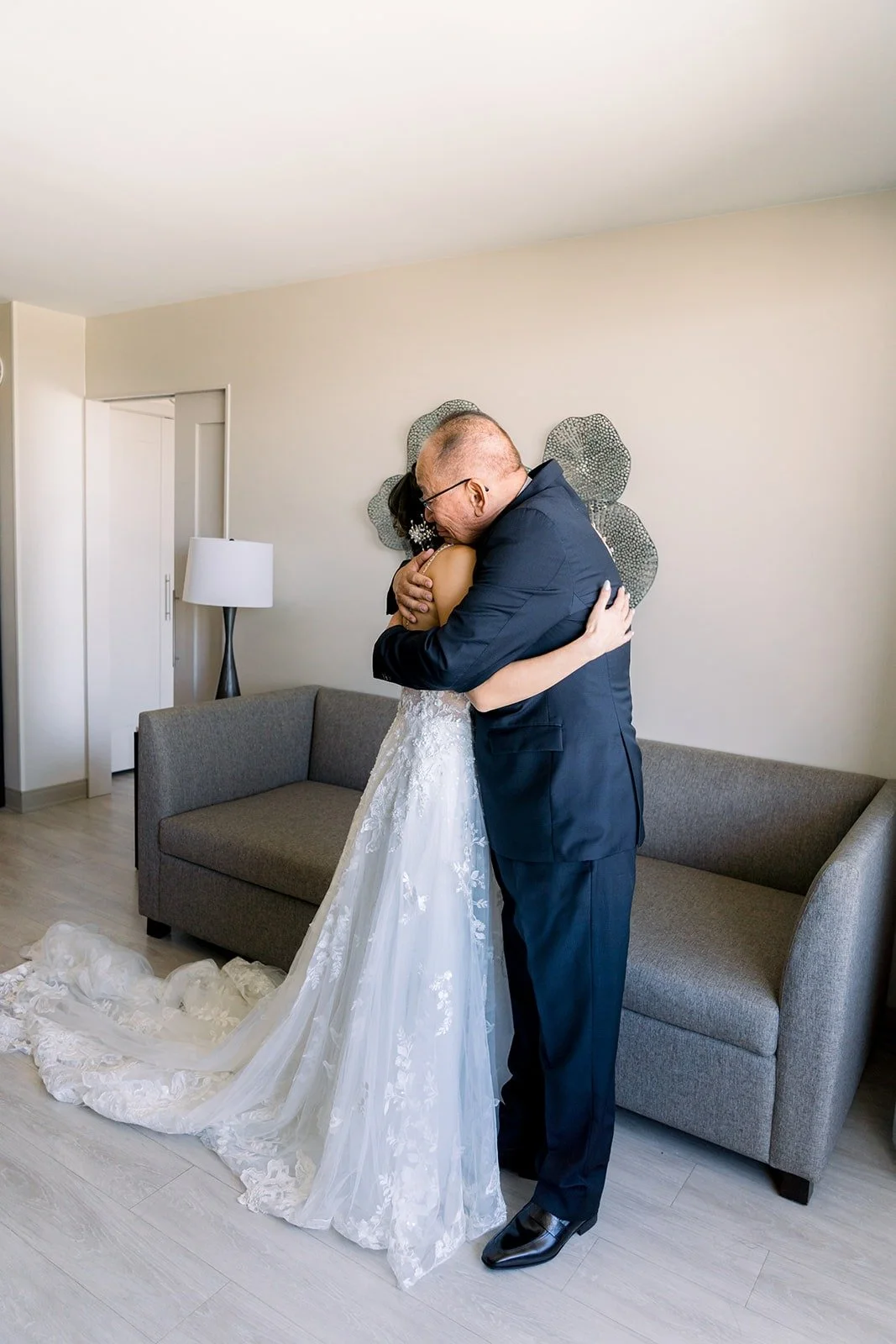 Josephine and her dad sharing a hug