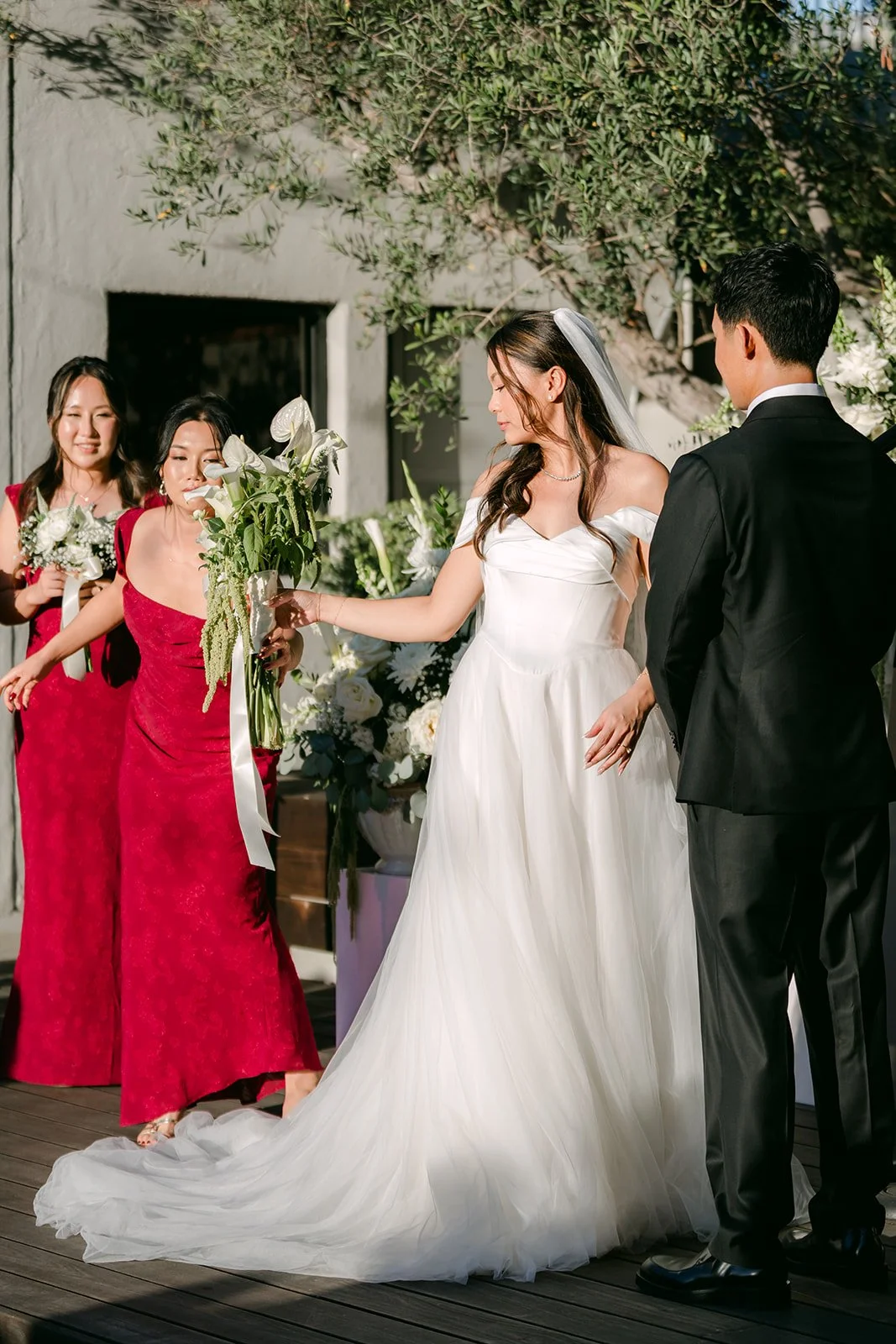 Jadee and Richard at the altar with the wedding party