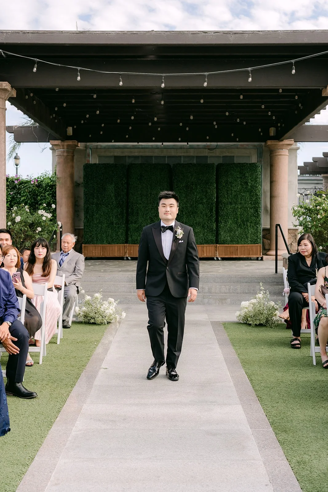 Kenny walking down the aisle at Old Ranch Country Club