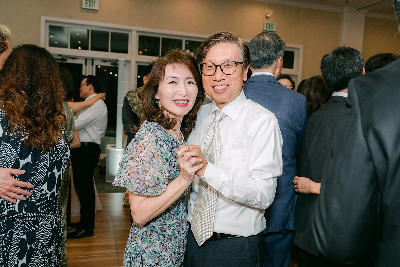 Guests dancing together on the dance floor