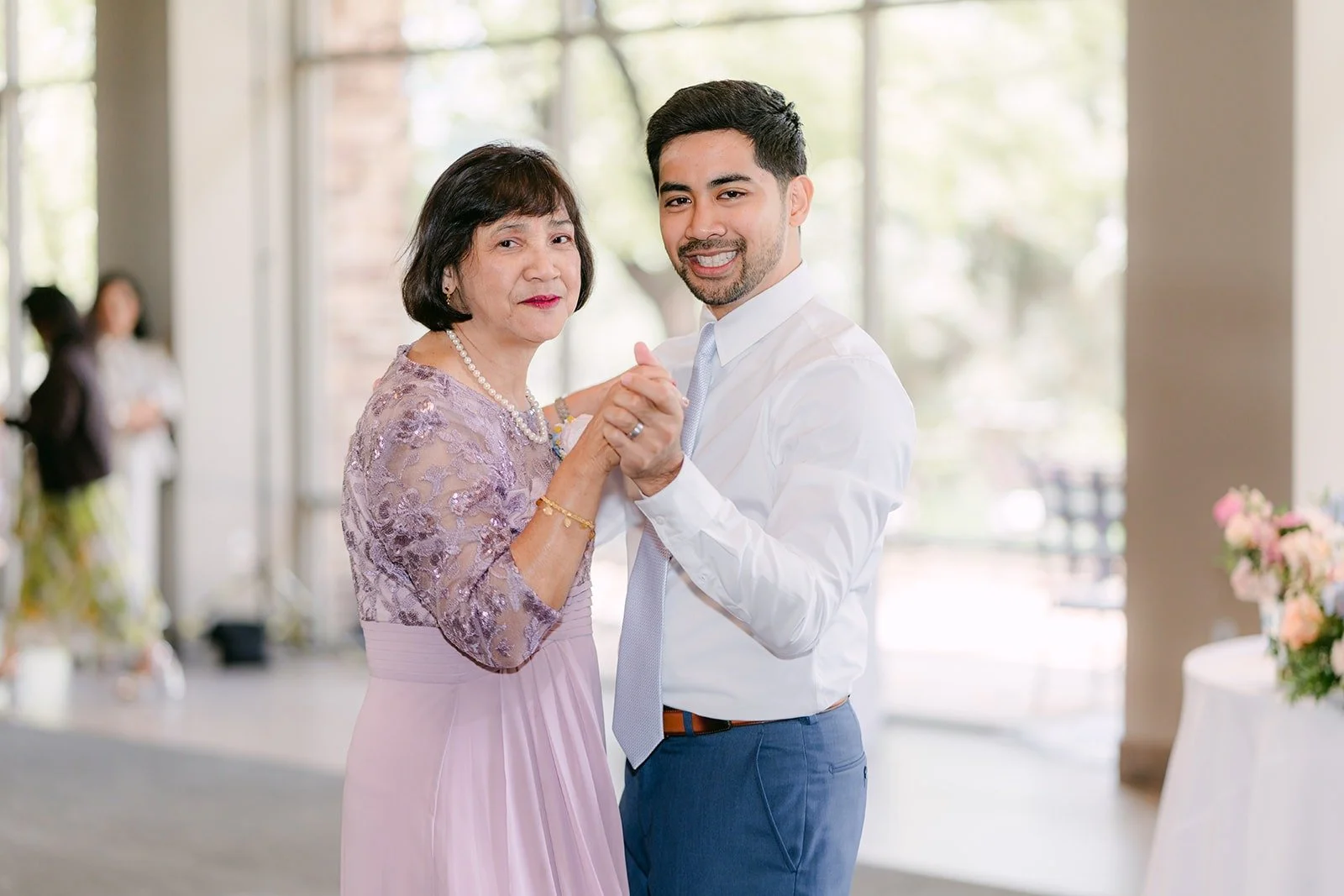 Mark and his mom smiling during their dance