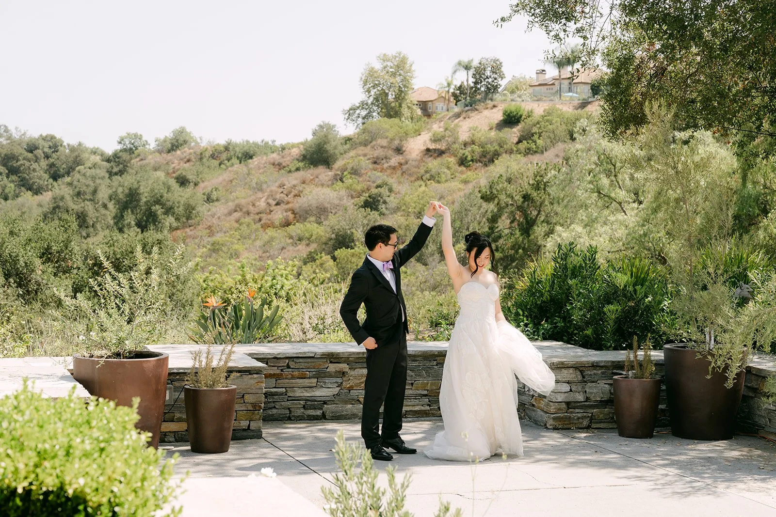 Patrick twirling Mary on the terrace