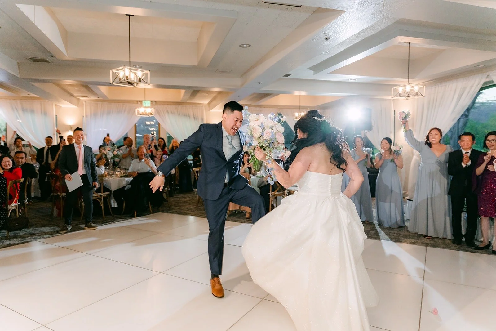 Florence and Jordan dancing their way onto the floor
