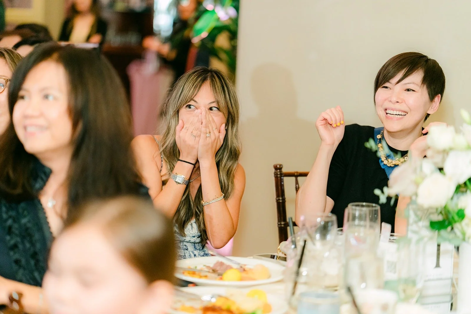 Guests at their table during the reception