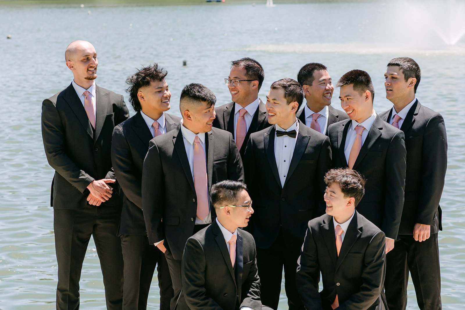 Austin and his groomsmen in black tuxedos