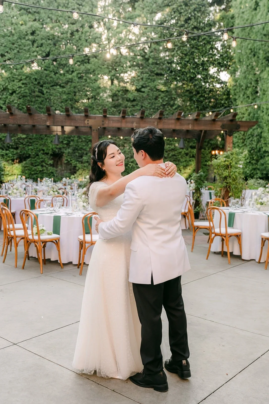 Min Soo holding Chorok close in the courtyard before the reception