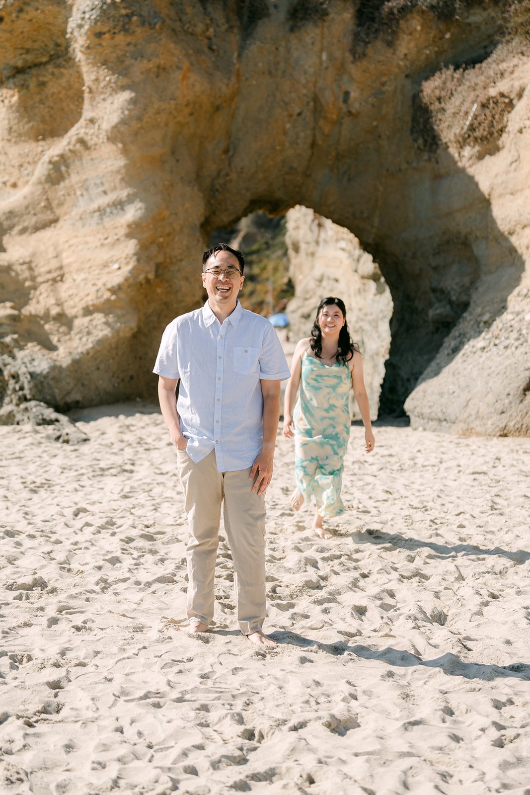 Lawrence walking ahead of Constance through the arch, photographed by One and Only Production.