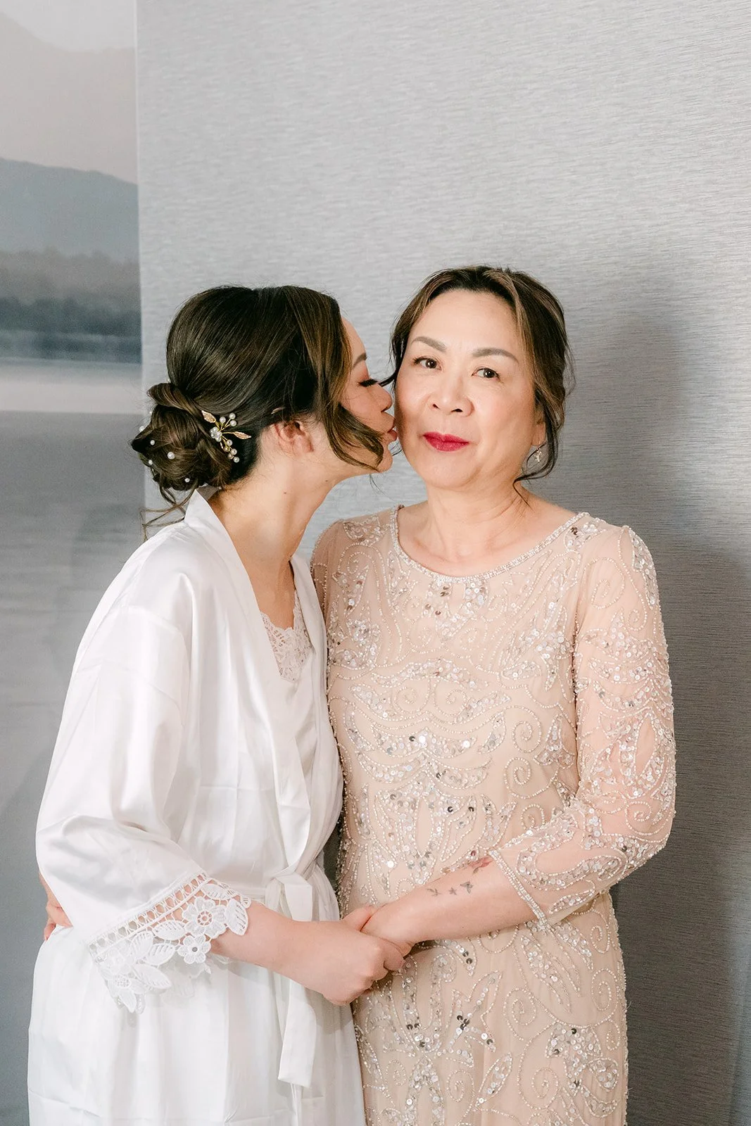 Amanda sharing a quiet moment with a loved one before the ceremony.