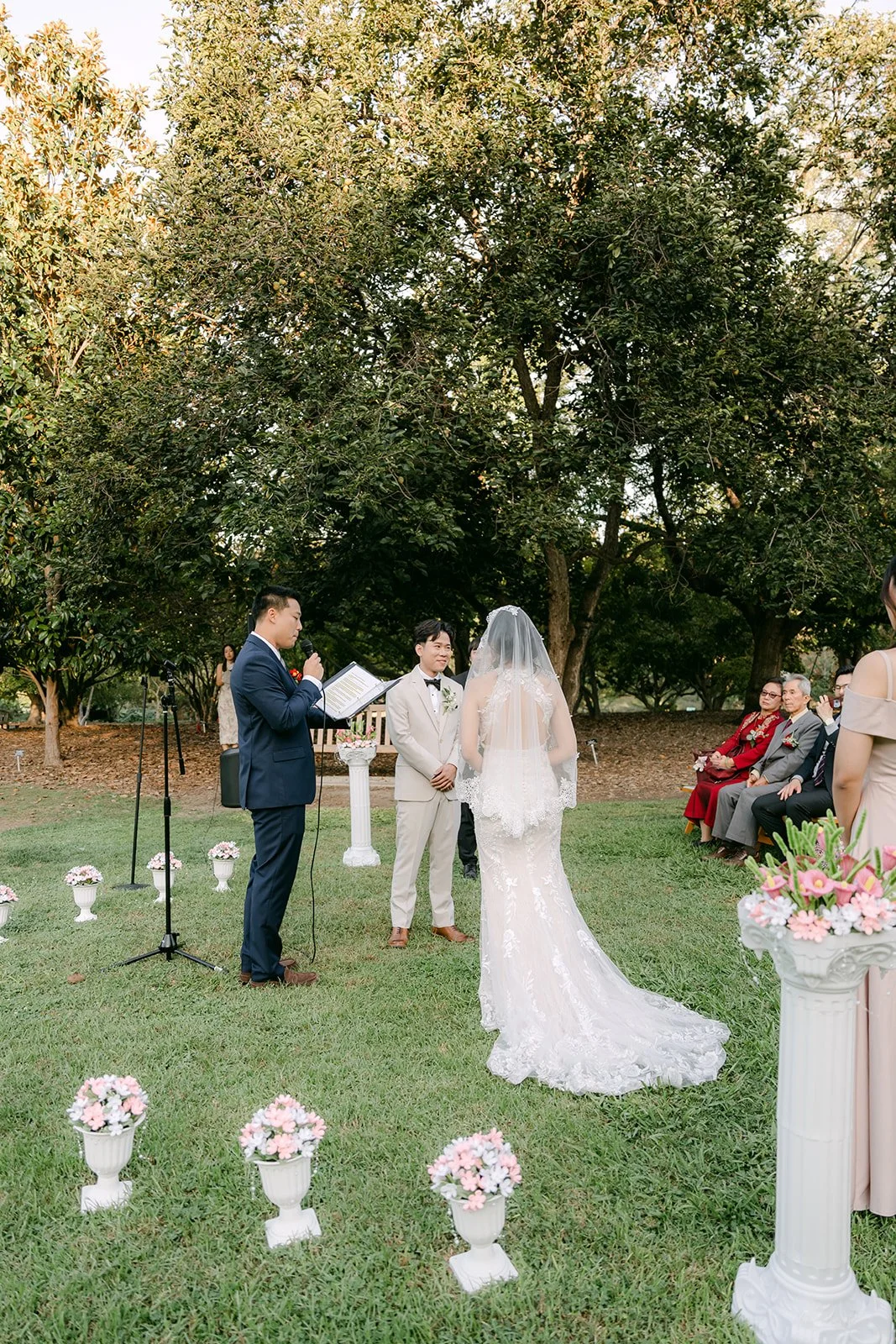 Elaine and Wen at the altar with their officiant.