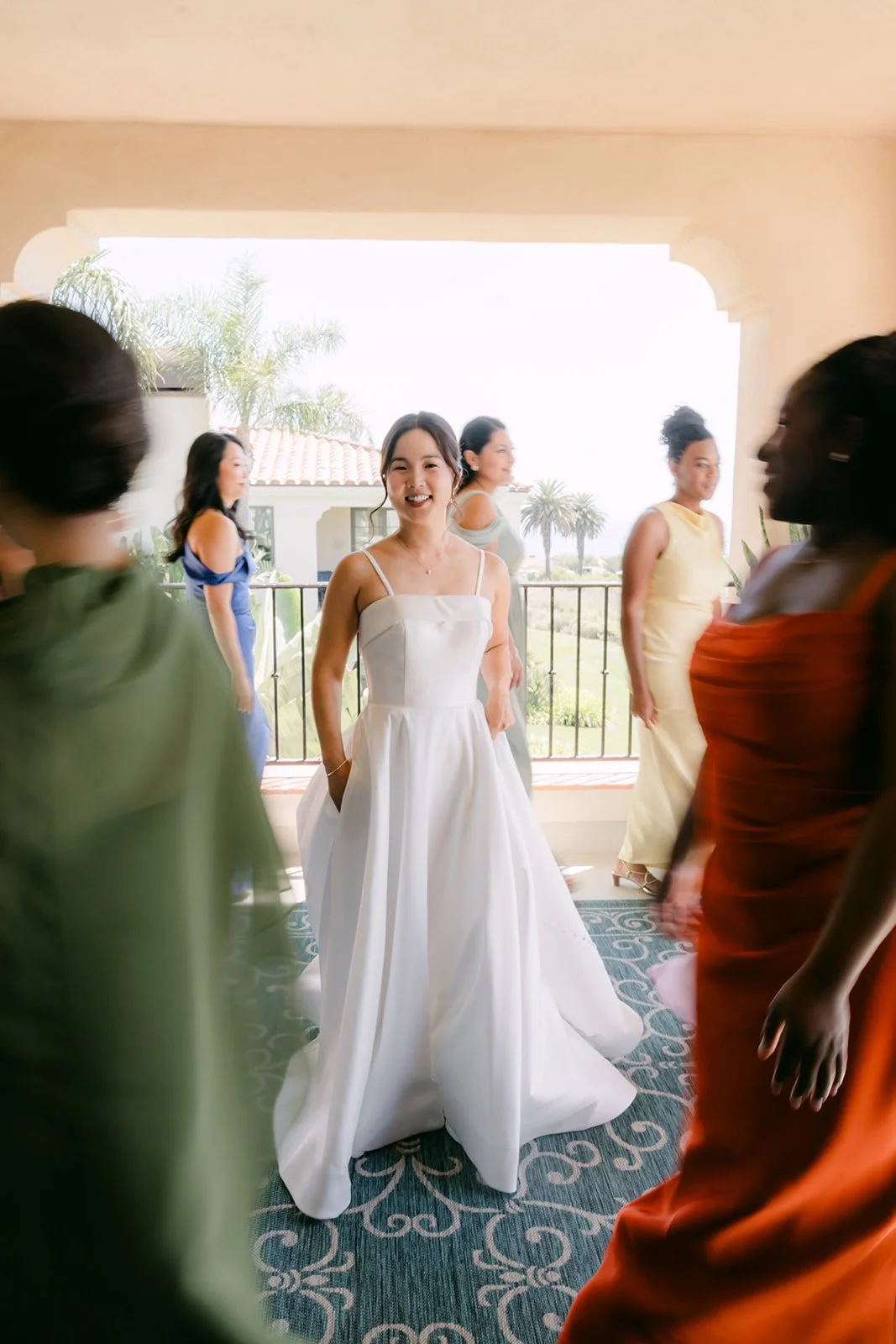 Saya surrounded by her bridesmaids in motion