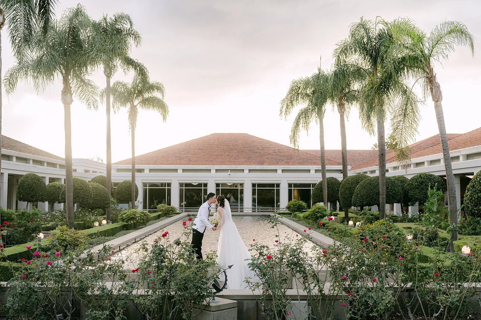Wide view of Jenny and Ryan at the end of the reflecting pool.