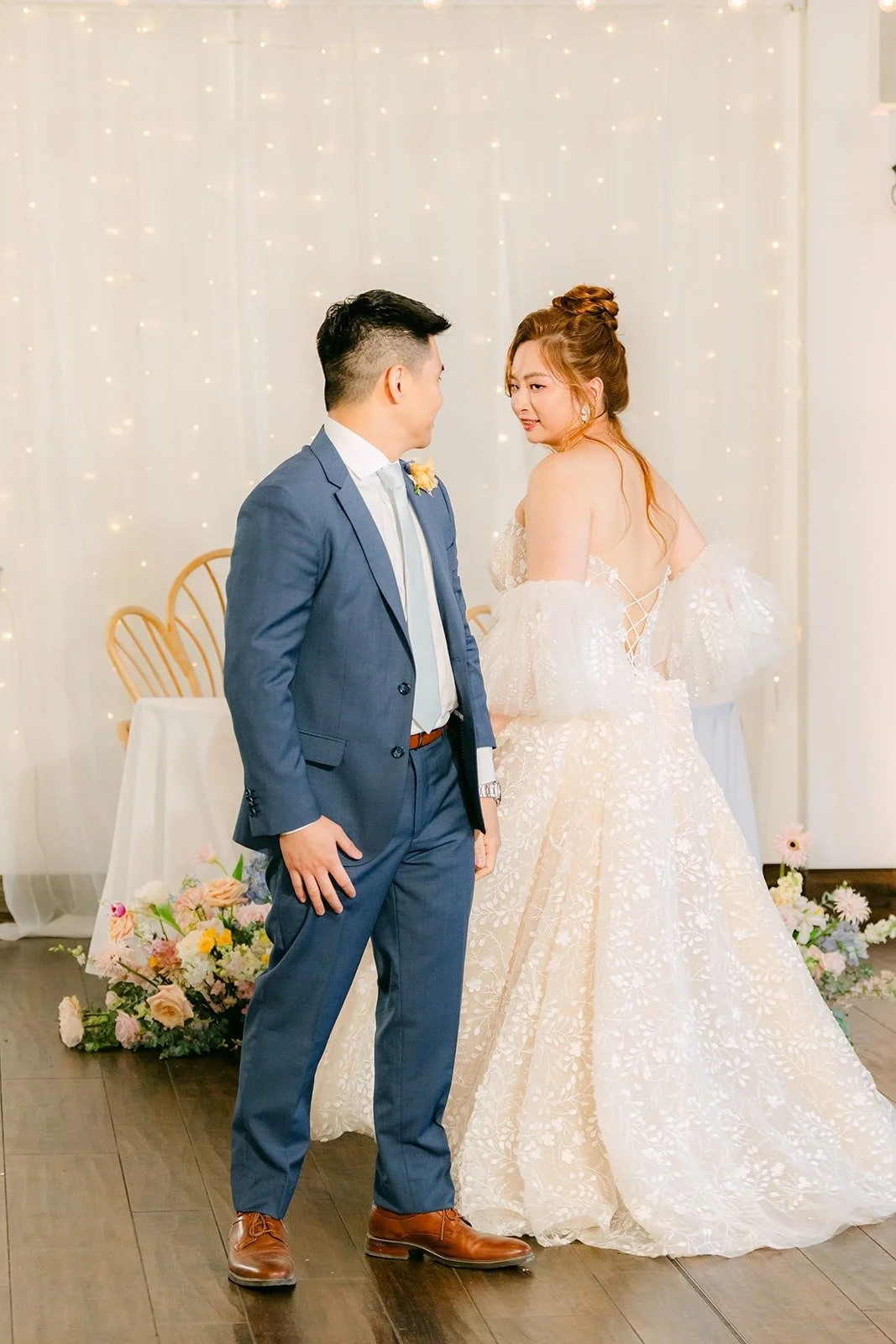 Joanna and Jerrick facing each other on the parlor dance floor