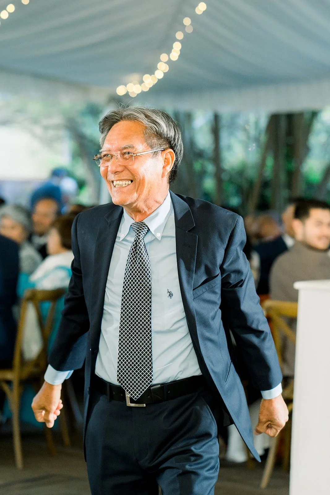 A guest dancing into the reception