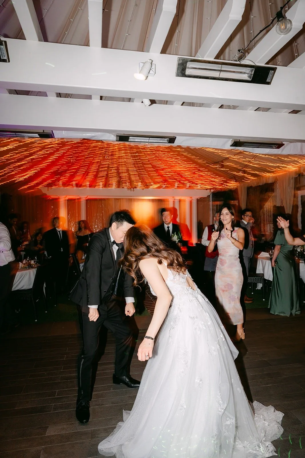 Valerie and Jason in the middle of the dance floor at Five Crowns, photographed by One and Only Production