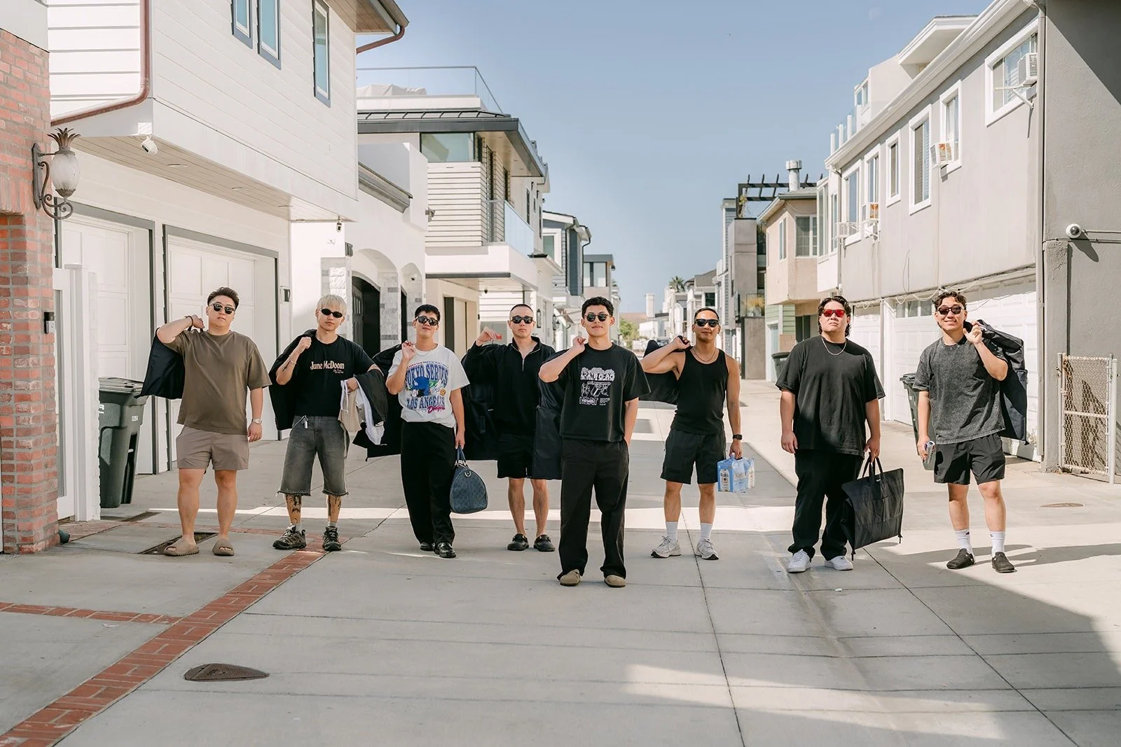 Richard and his groomsmen walking down a Newport Beach street on game day