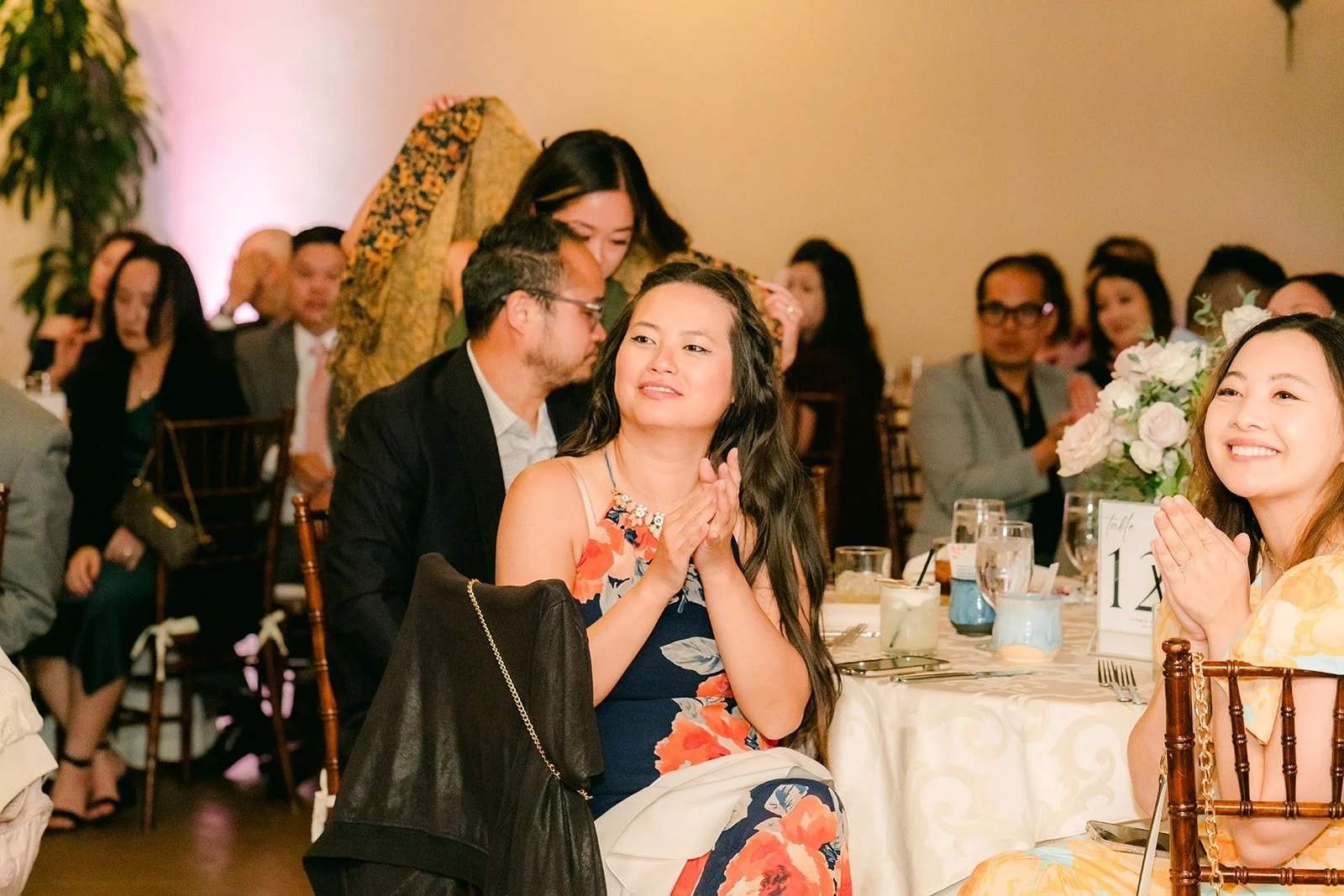 Guests laughing during the speeches