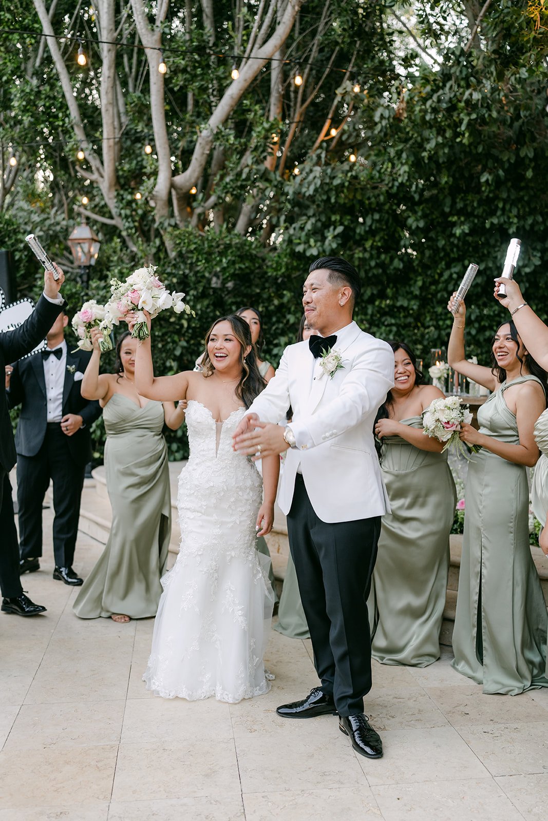 Nicole and Caryl dancing into their reception as Mr. and Mrs. Hernandez.