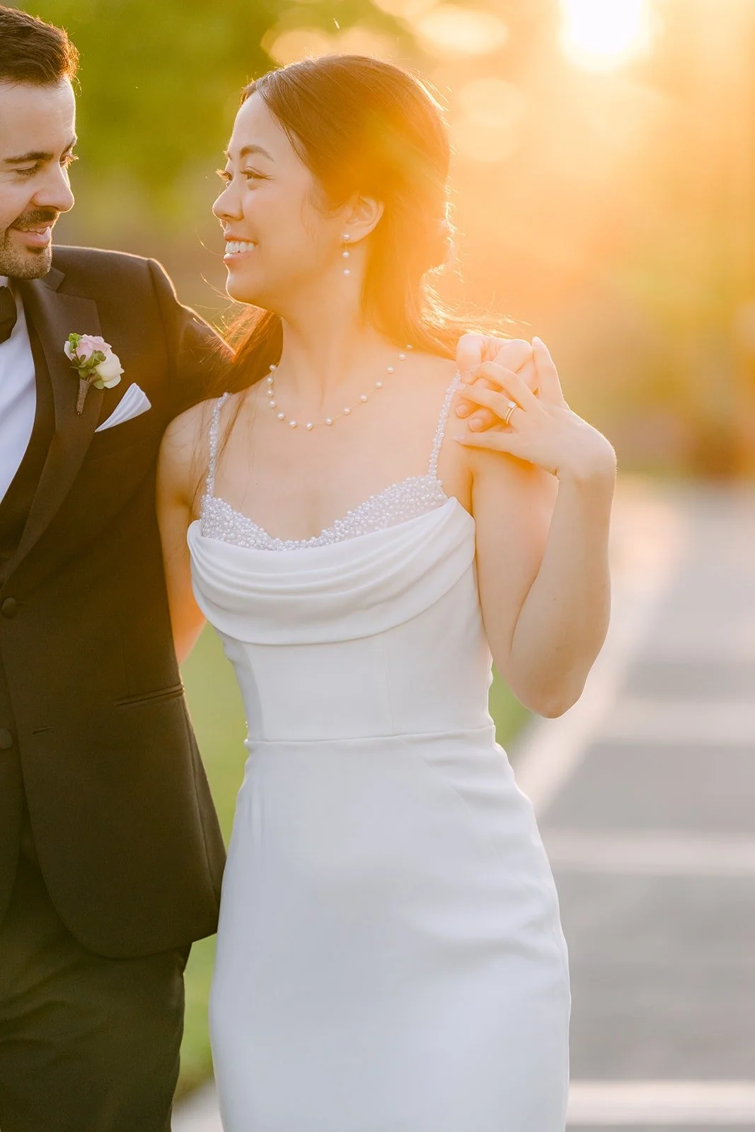 Stephanie glowing in the sunset light beside Kevin