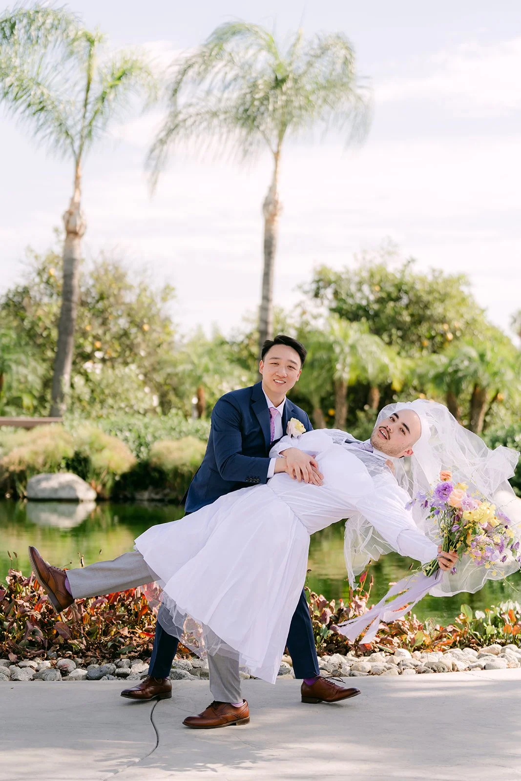 Elijah dipping the fake bride among the palms.