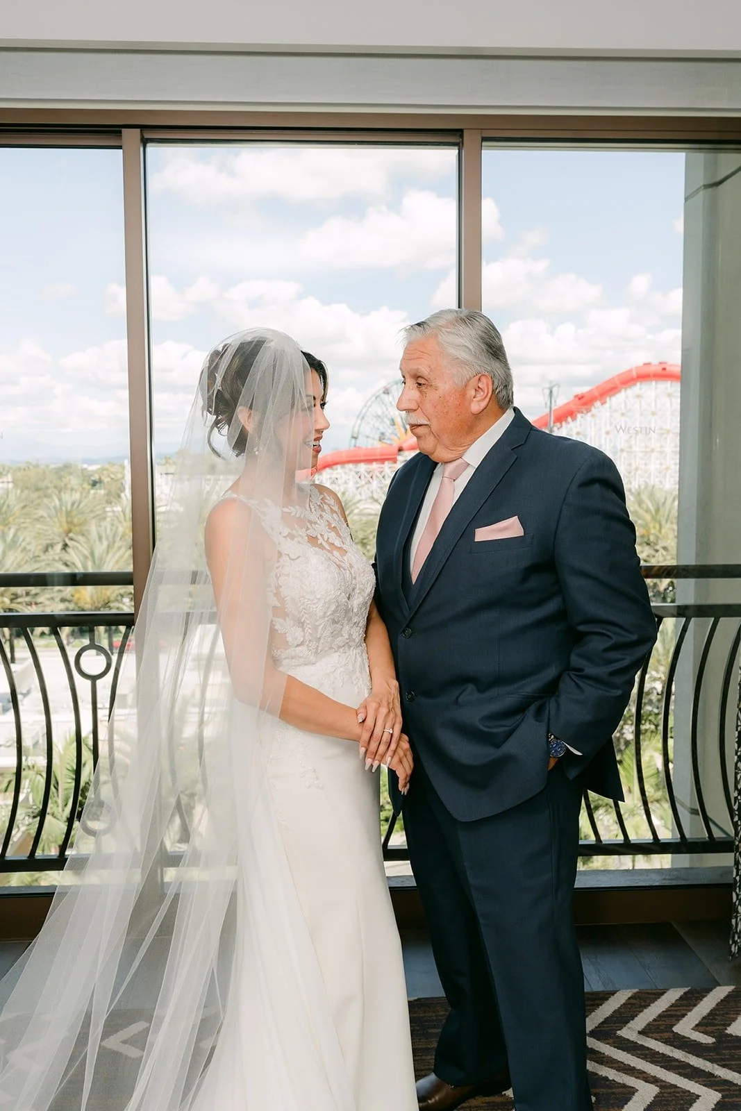 Francesca shares a moment with a family member by the window