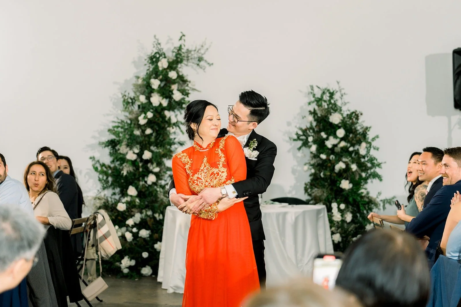 Cindy and Alex's first dance between the floral columns at The East Angel