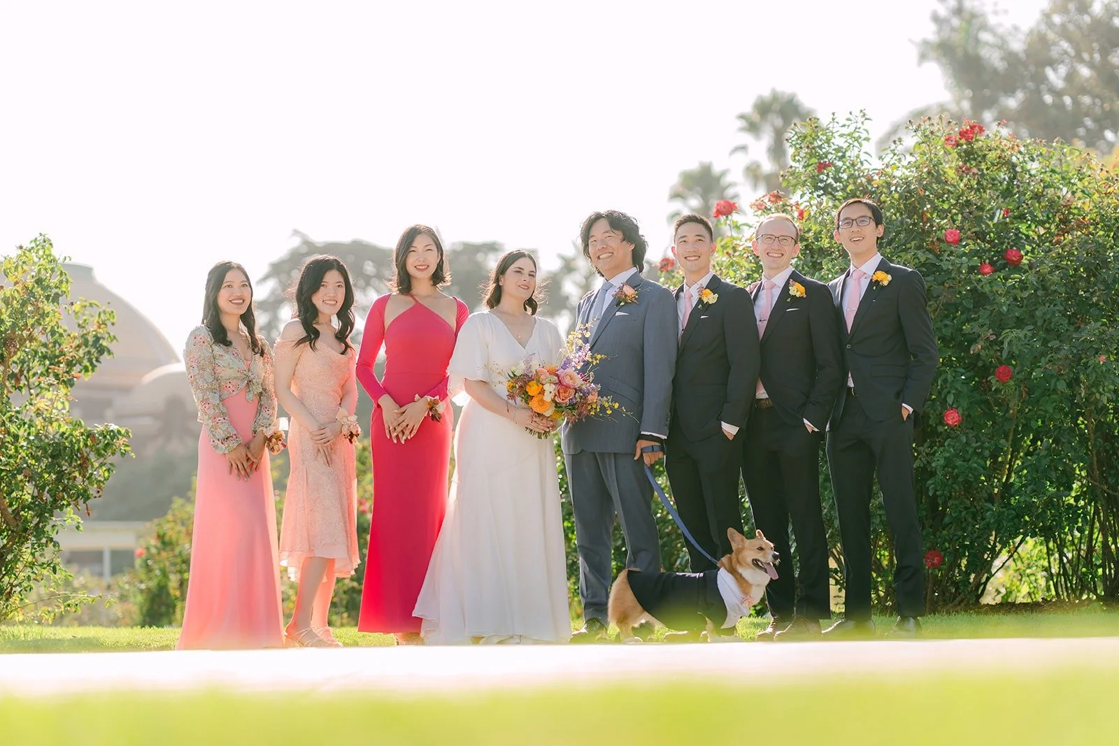 Jessie, Philip and their wedding party in the Rose Garden