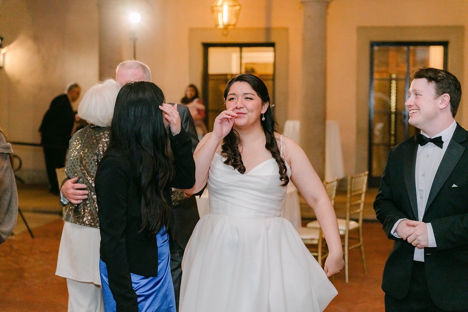 Saira and Matthew dancing with friends