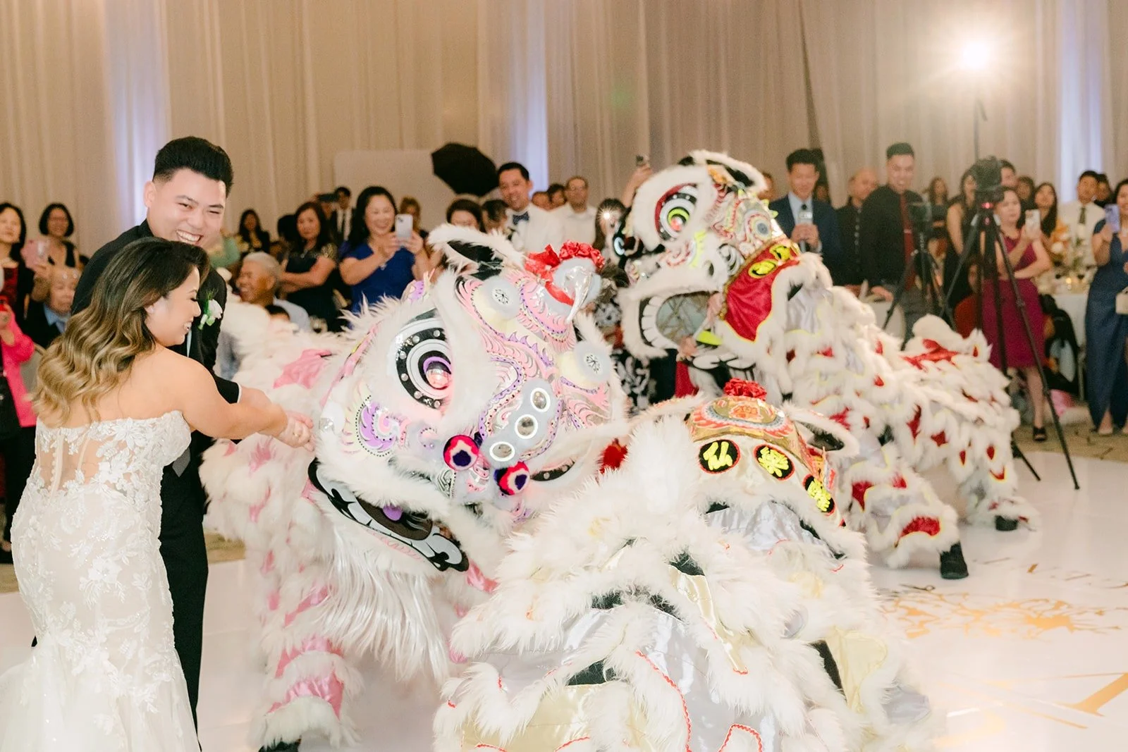 Candice and Vincent feeding the lions at their table