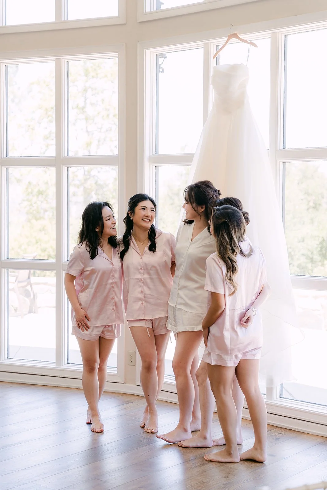 Judy and her bridesmaids in matching pink pajamas