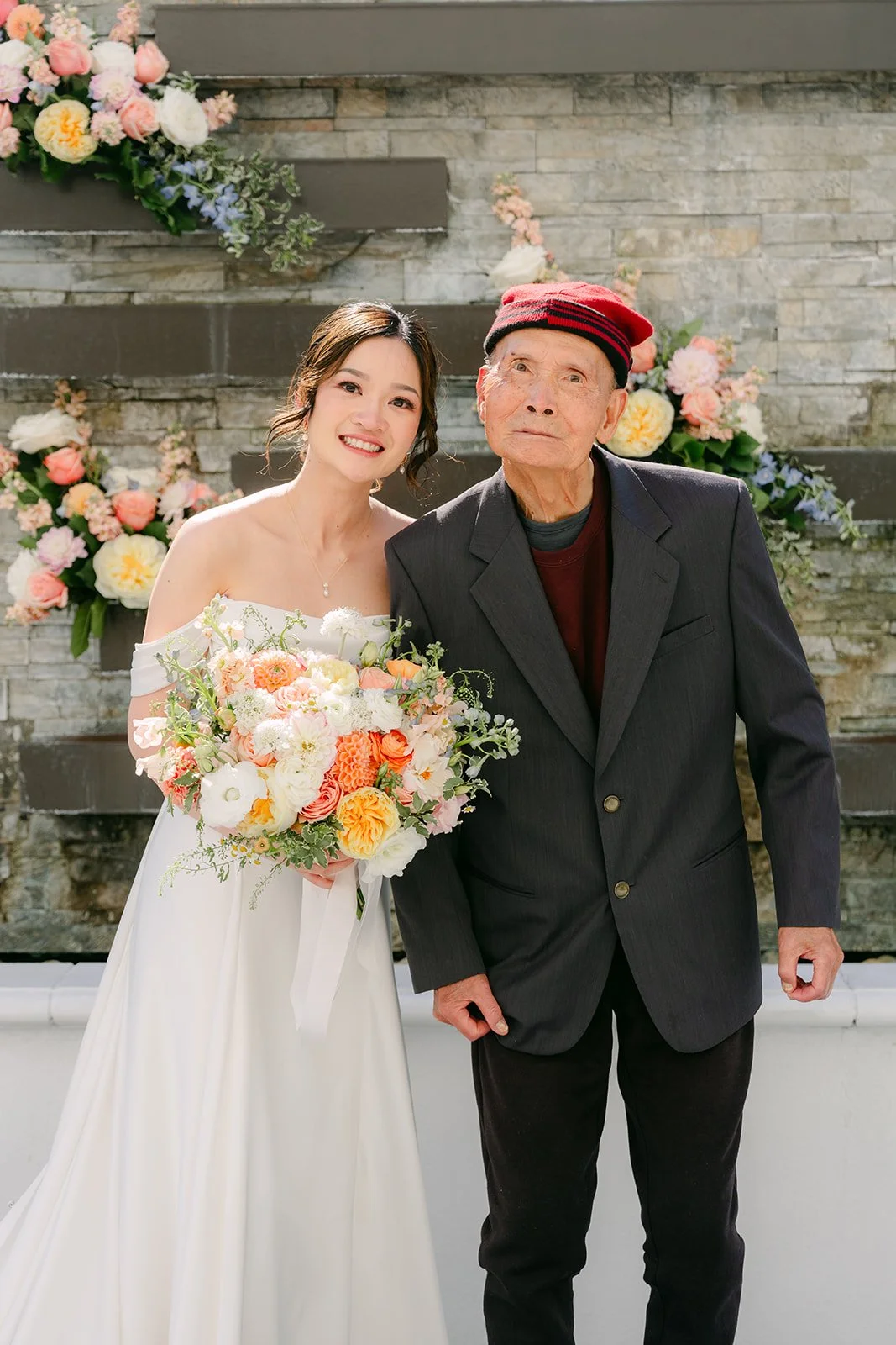Amanda and her grandpa smiling together.