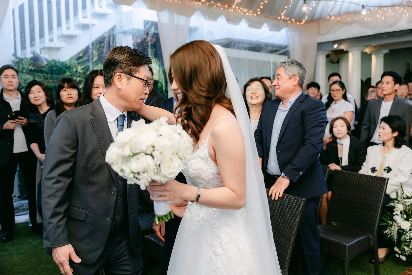 Jason greeting Valerie at the end of the aisle