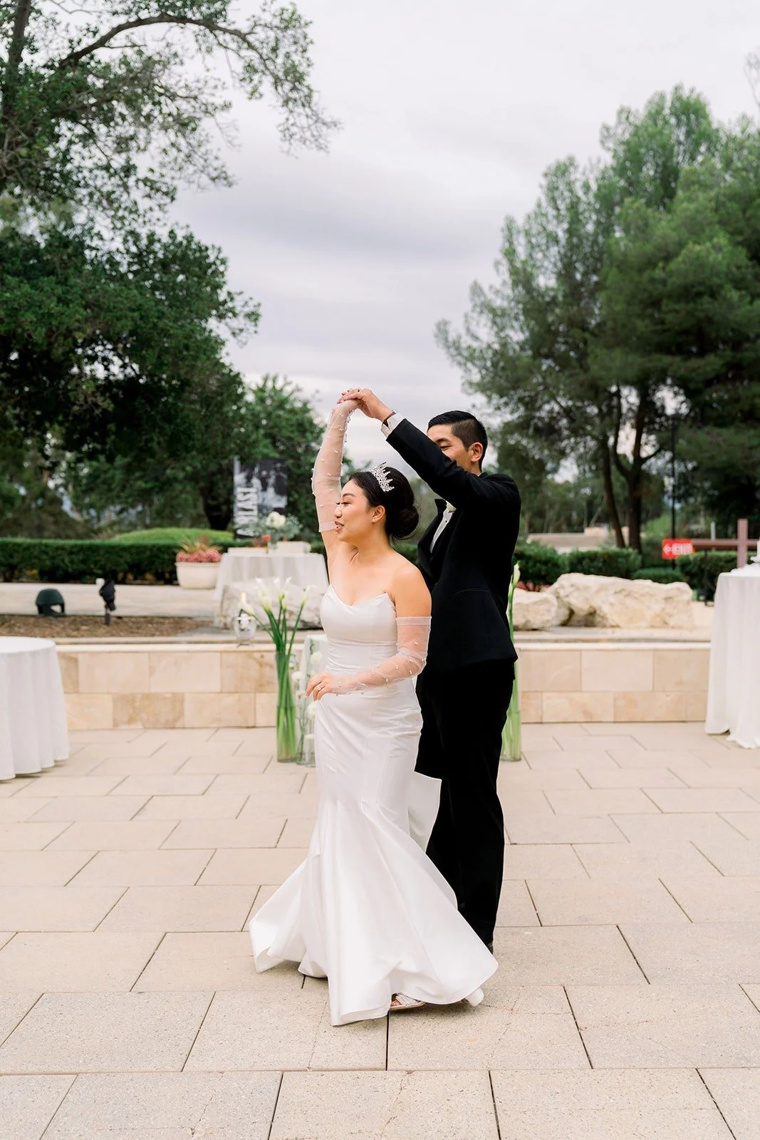 Steven spins Jacinda during their first dance