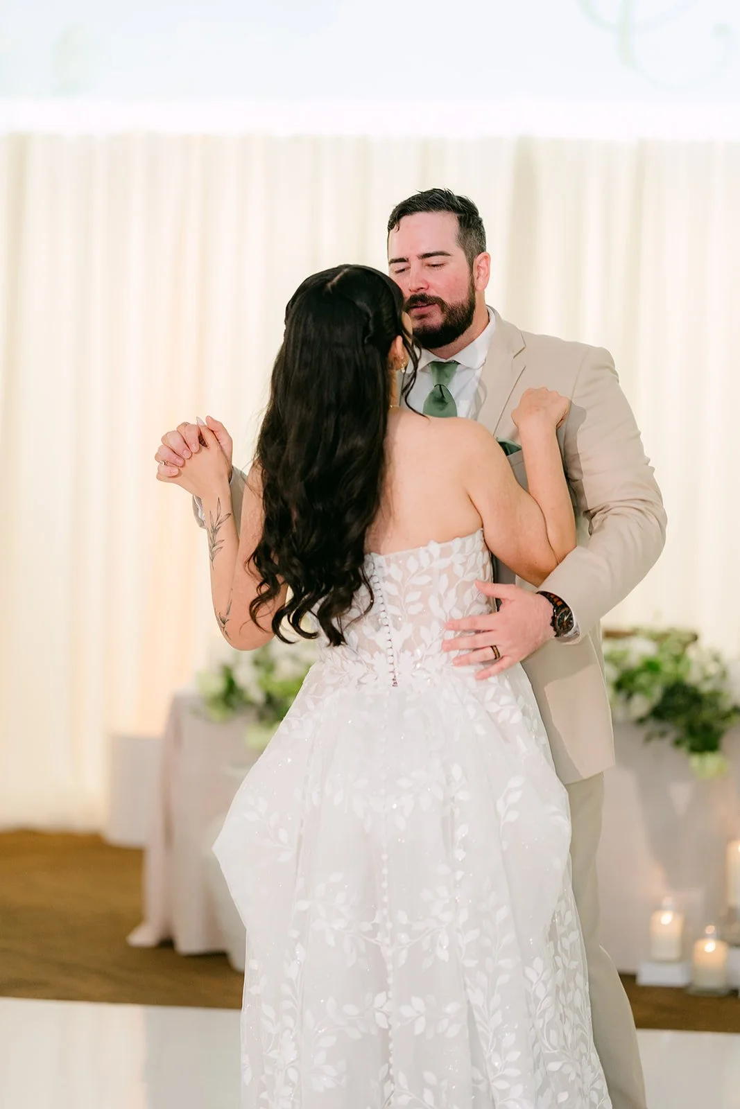 Cody holding Fernanda during their first dance.