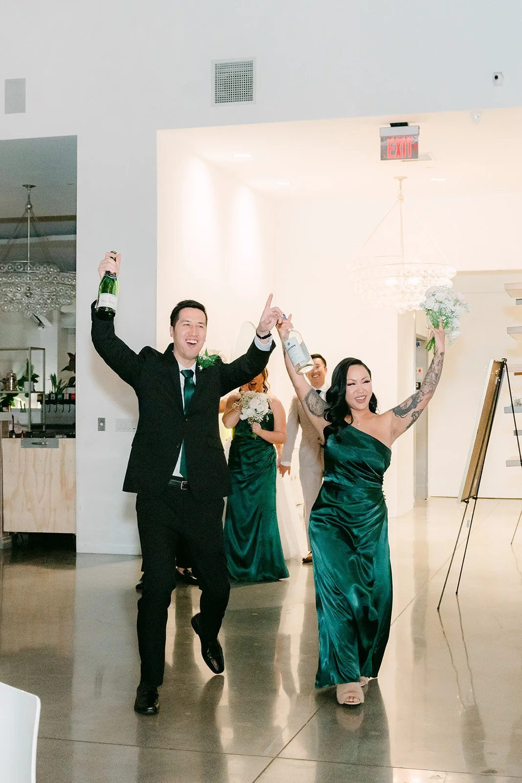 Wedding party making a grand entrance into the reception