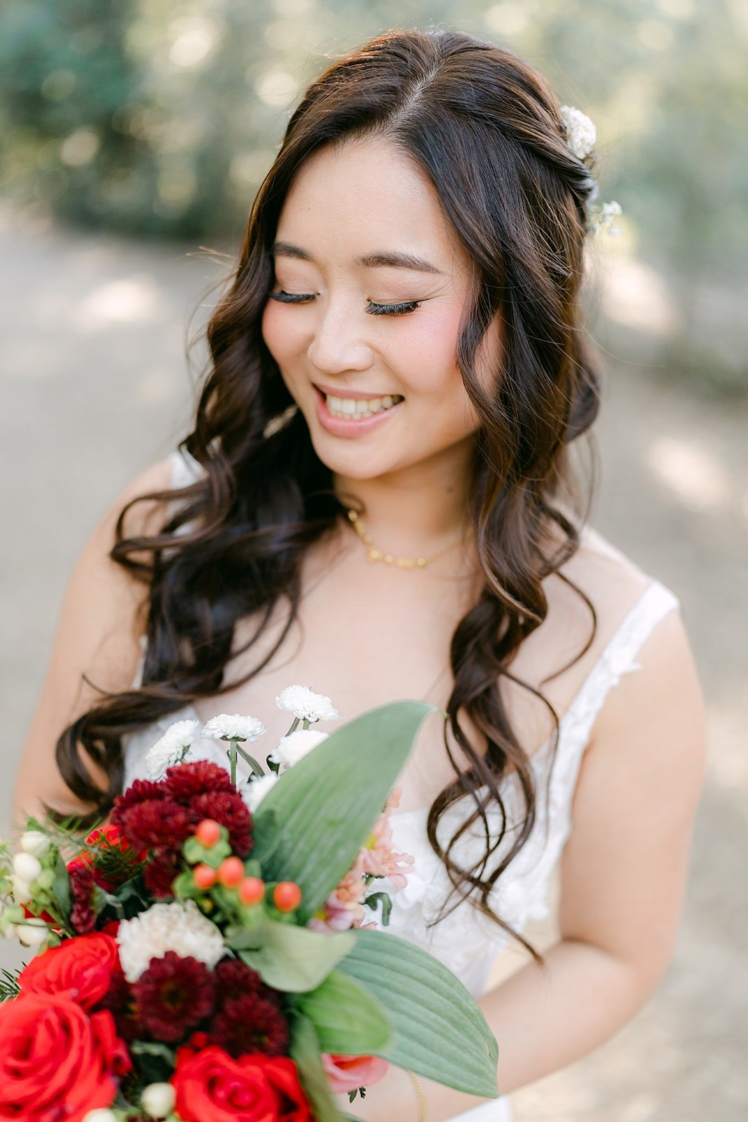 Close portrait of Shayna with her bouquet at Oak Canyon Nature Center