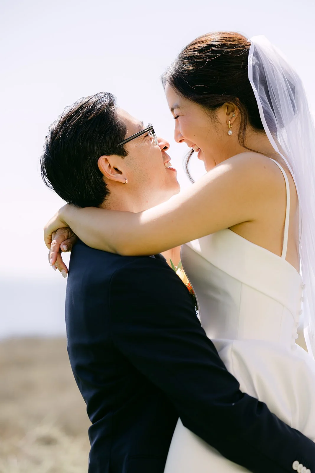 Saya and Leroy forehead to forehead on the bluff