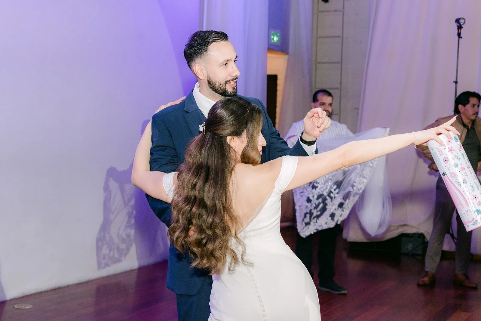 Mariana and Danny dancing during the reception games
