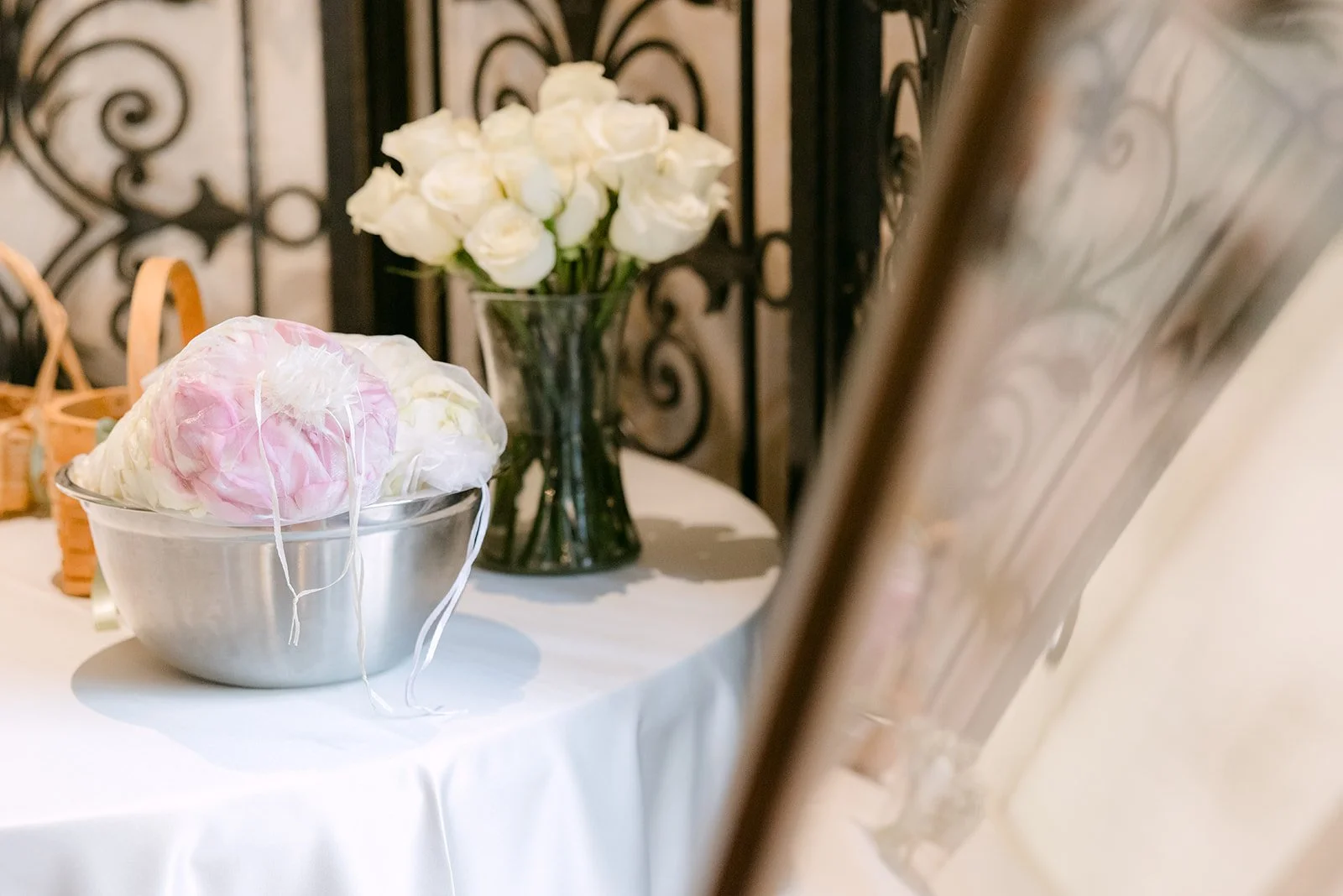 White roses and a card box on the welcome table
