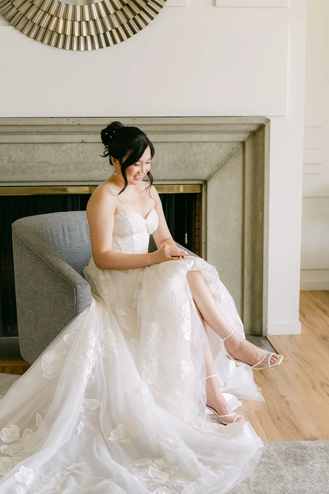 Mary fastening her shoes in the bridal suite