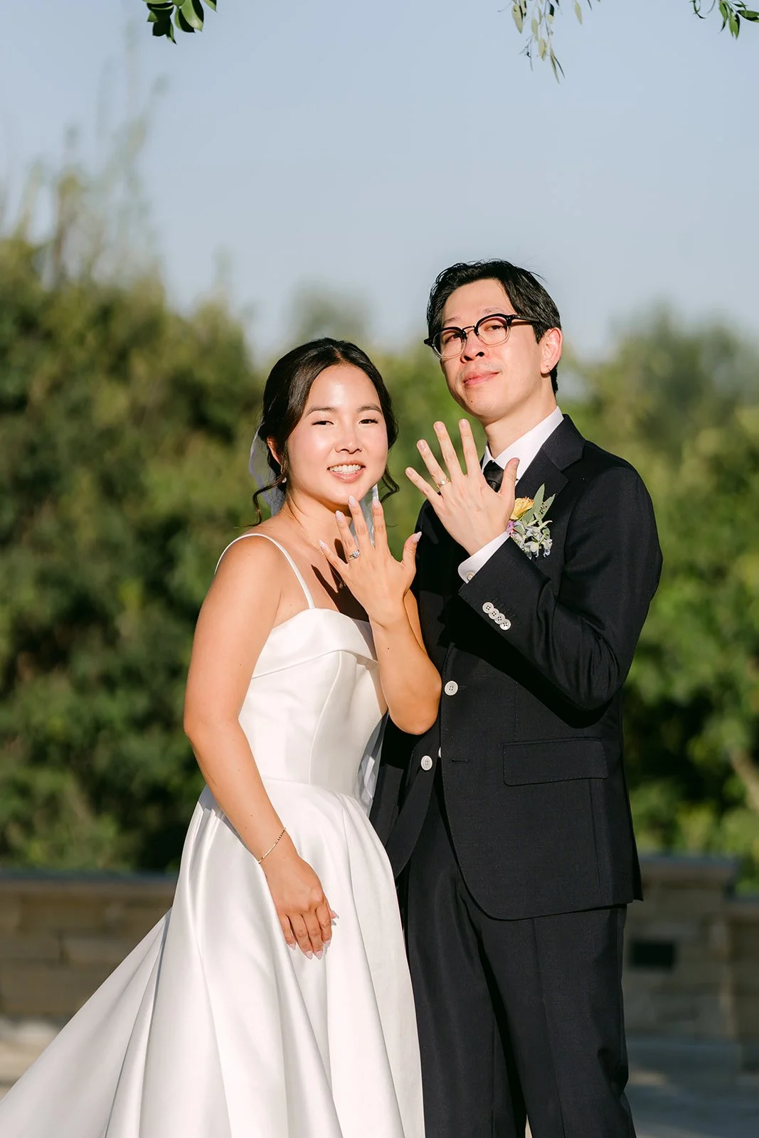 Showing off the new wedding ring after the ceremony