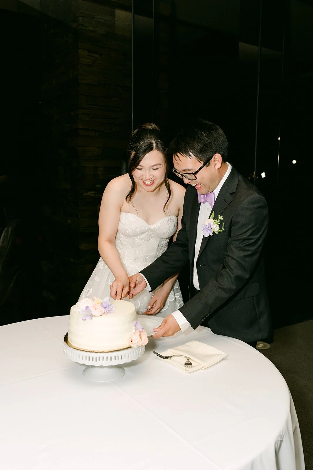 Cutting the wedding cake at Dove Canyon